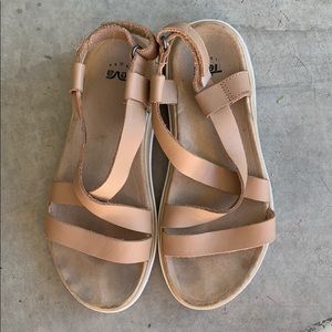 Teva leather tan sandals with suede interior.